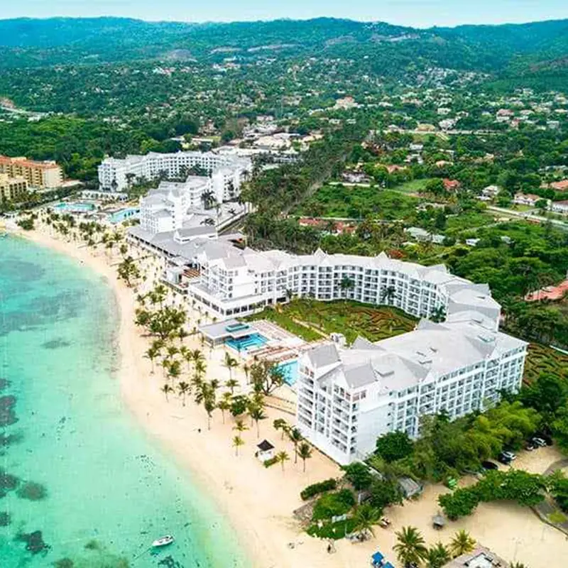 A resort is shown from above on the beach.