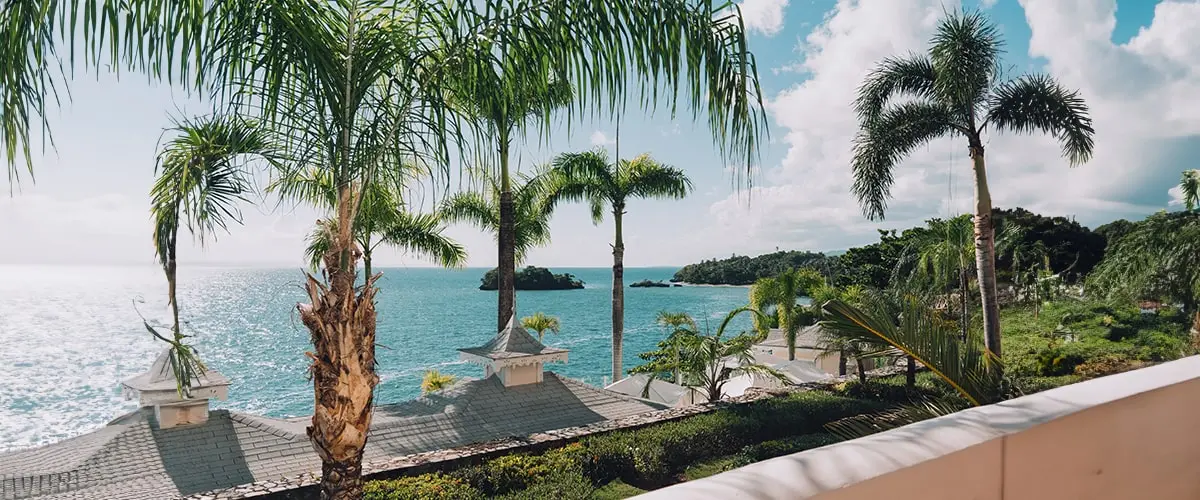 A view of the ocean from an outdoor patio.