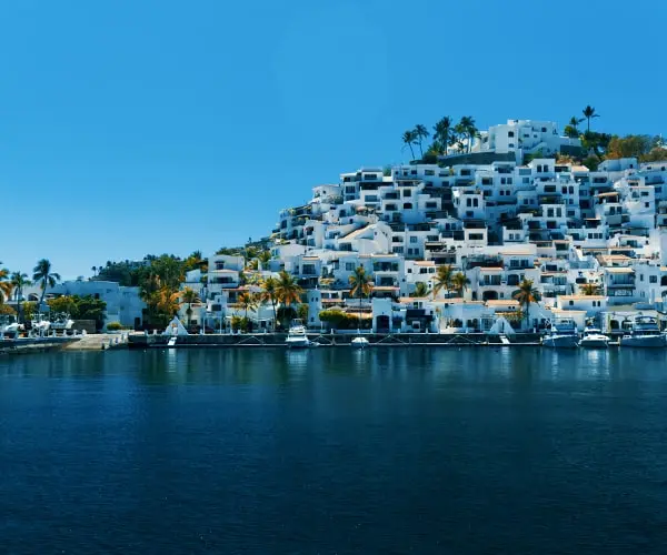 A large group of houses on top of a hill.