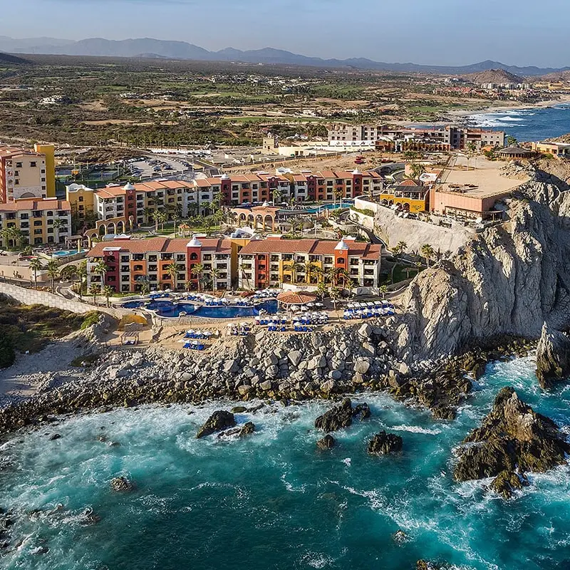 A view of the ocean and cliffs from above.